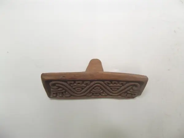 Sello de barro cocido